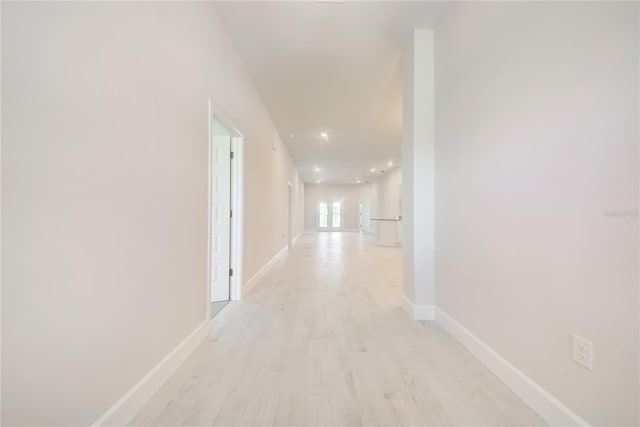 16433 66th Ln E, Parrish, FL 34219 - hallway with baseboards, light wood-type flooring, and recessed lighting