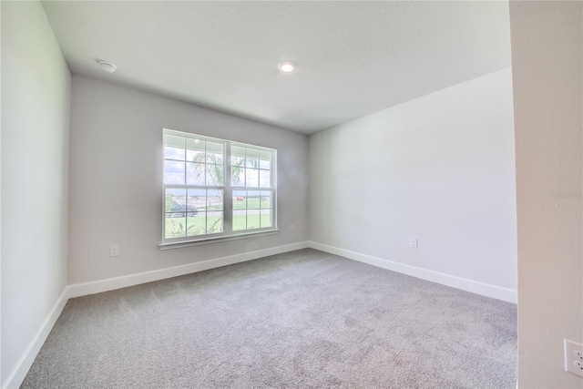 16433 66th Ln E, Parrish, FL 34219 - unfurnished room with carpet flooring and baseboards