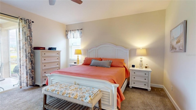 9800 Sago Point Dr, Seminole, FL 33777 - bedroom with carpet flooring, ceiling fan, and baseboards