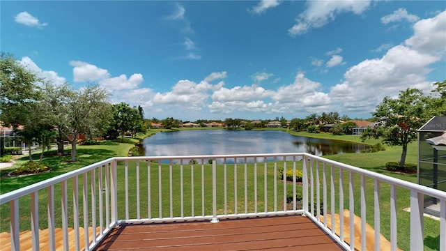 9800 Sago Point Dr, Seminole, FL 33777 - wooden deck with a water view and a yard