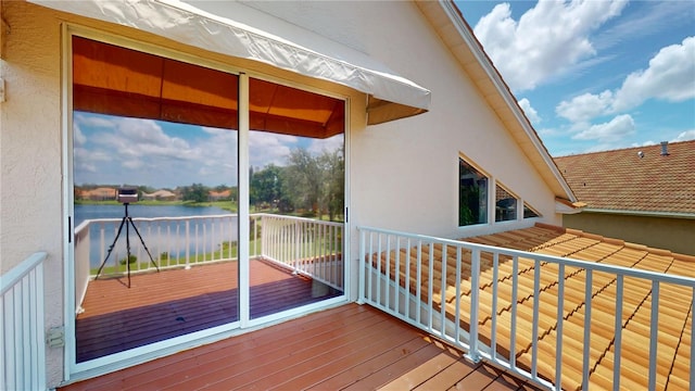 9800 Sago Point Dr, Seminole, FL 33777 - wooden terrace with a water view