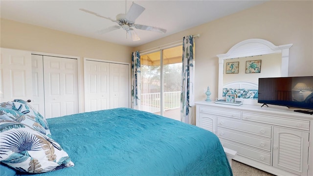 9800 Sago Point Dr, Seminole, FL 33777 - carpeted bedroom with access to outside, multiple closets, and a ceiling fan