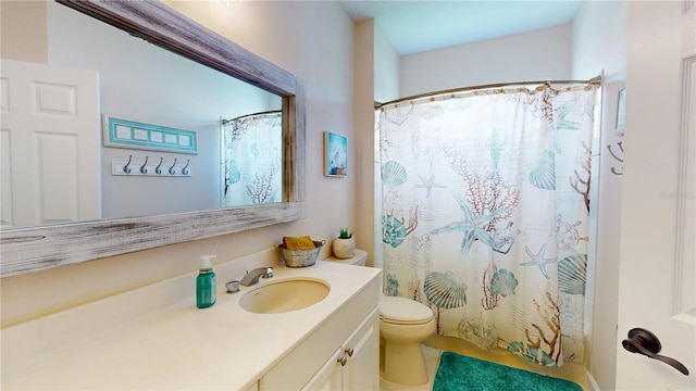 9800 Sago Point Dr, Seminole, FL 33777 - full bathroom featuring vanity, toilet, and a shower with shower curtain
