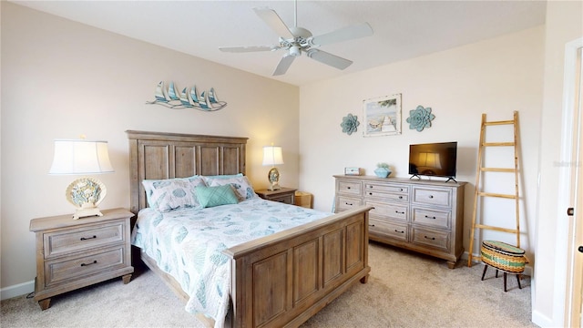 9800 Sago Point Dr, Seminole, FL 33777 - bedroom featuring light colored carpet and ceiling fan