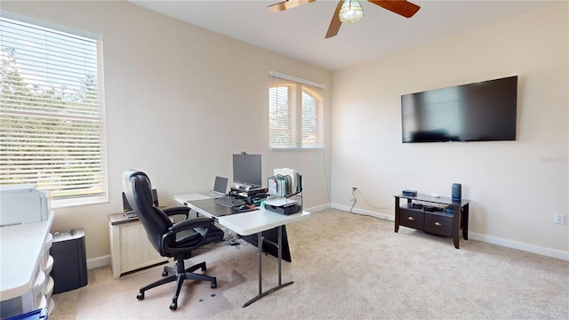 9800 Sago Point Dr, Seminole, FL 33777 - home office featuring ceiling fan, carpet flooring, and baseboards