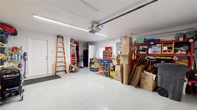 9800 Sago Point Dr, Seminole, FL 33777 - garage with a garage door opener and electric panel