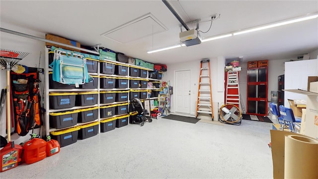 9800 Sago Point Dr, Seminole, FL 33777 - garage with a garage door opener