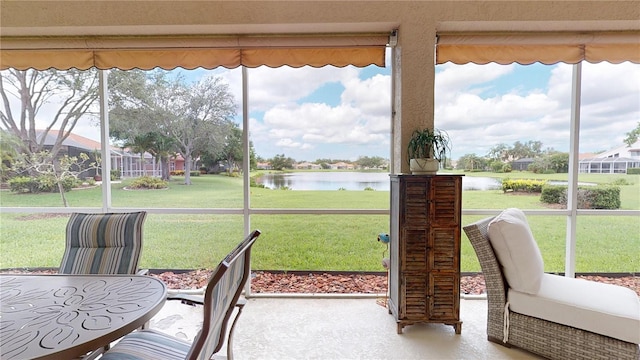 9800 Sago Point Dr, Seminole, FL 33777 - sunroom featuring a water view