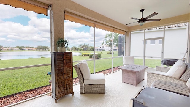 9800 Sago Point Dr, Seminole, FL 33777 - sunroom / solarium featuring a water view and a ceiling fan