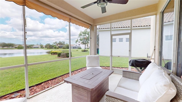 9800 Sago Point Dr, Seminole, FL 33777 - sunroom / solarium featuring a water view, ceiling fan, and healthy amount of natural light