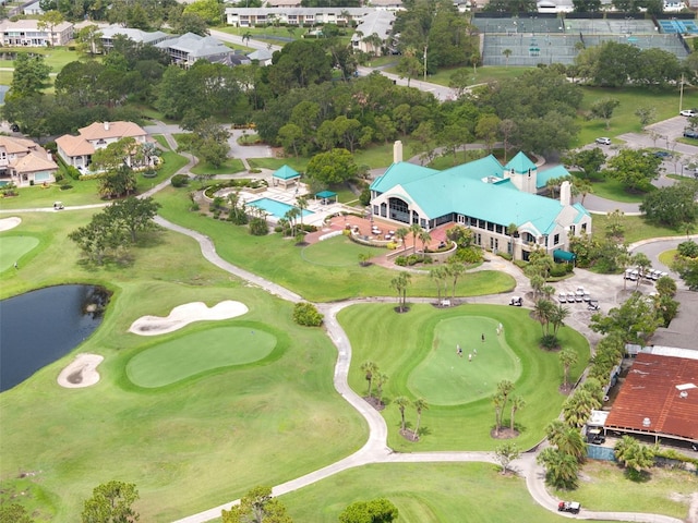 9800 Sago Point Dr, Seminole, FL 33777 - bird's eye view of a local golf course and a nearby body of water
