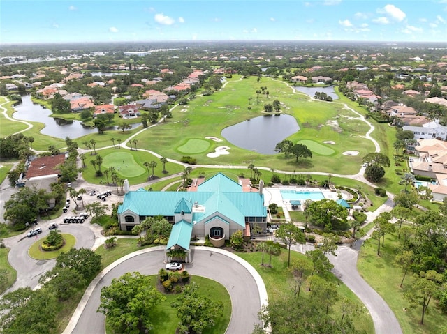 9800 Sago Point Dr, Seminole, FL 33777 - aerial perspective of suburban area with a nearby body of water and a golf course