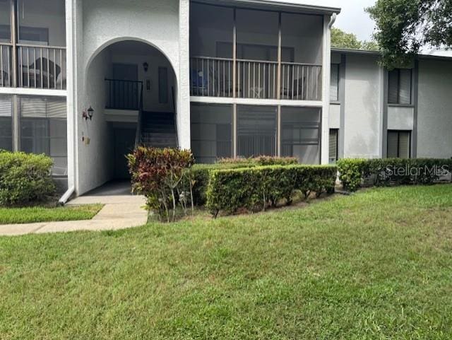 1258 Pine Ridge Cir W Unit F1, Tarpon Springs, FL 34688 - view of building exterior