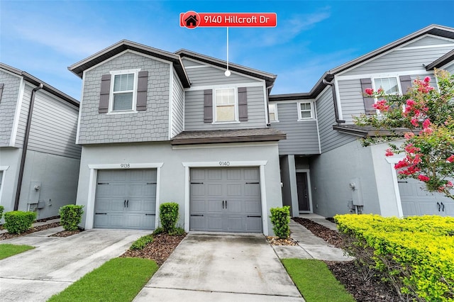 9140 Hillcroft Dr, Riverview, FL 33578 - view of property with stucco siding, concrete driveway, and a garage
