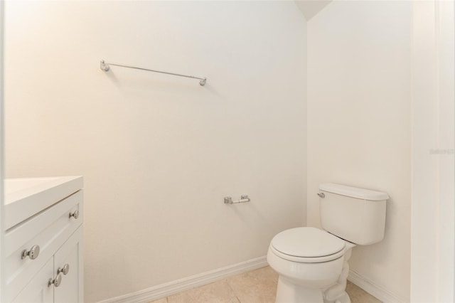 9140 Hillcroft Dr, Riverview, FL 33578 - bathroom with vanity, toilet, baseboards, and tile patterned flooring