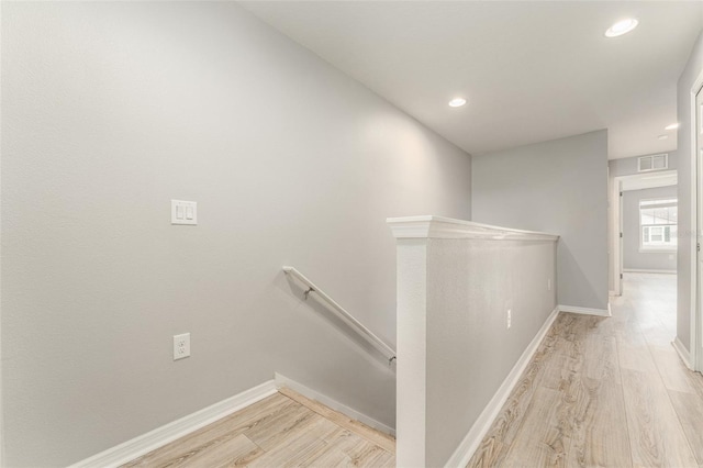9140 Hillcroft Dr, Riverview, FL 33578 - hallway featuring an upstairs landing, light wood-style flooring, baseboards, and recessed lighting