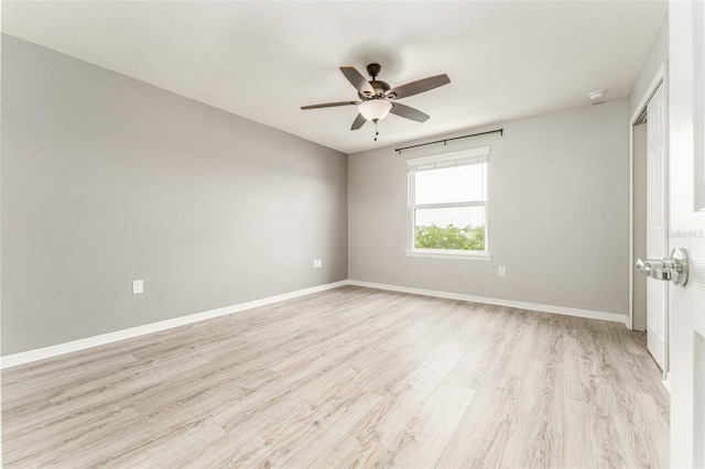 9140 Hillcroft Dr, Riverview, FL 33578 - spare room featuring a ceiling fan, light wood-style floors, baseboards, and a smoke detector
