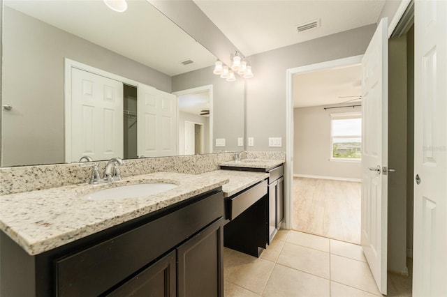 9140 Hillcroft Dr, Riverview, FL 33578 - full bath featuring double vanity, tile patterned floors, and baseboards