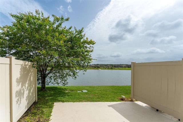 9140 Hillcroft Dr, Riverview, FL 33578 - view of green lawn featuring a water view and a patio