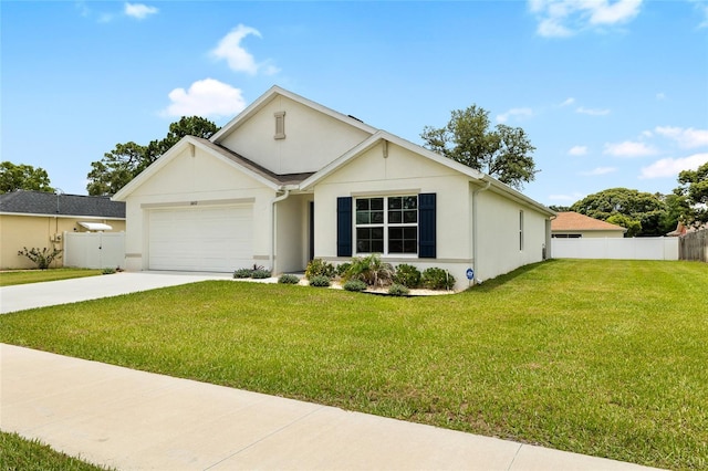 10452 Elgin Blvd, Spring Hill, FL 34608 - view of front of house with concrete driveway, an attached garage, and stucco siding