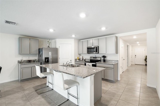 10452 Elgin Blvd, Spring Hill, FL 34608 - kitchen featuring stainless steel appliances, gray cabinetry, a sink, and recessed lighting