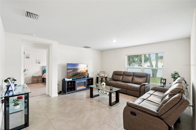 10452 Elgin Blvd, Spring Hill, FL 34608 - living area with light tile patterned flooring