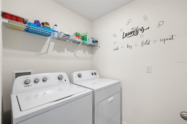 10452 Elgin Blvd, Spring Hill, FL 34608 - laundry room featuring washer and clothes dryer