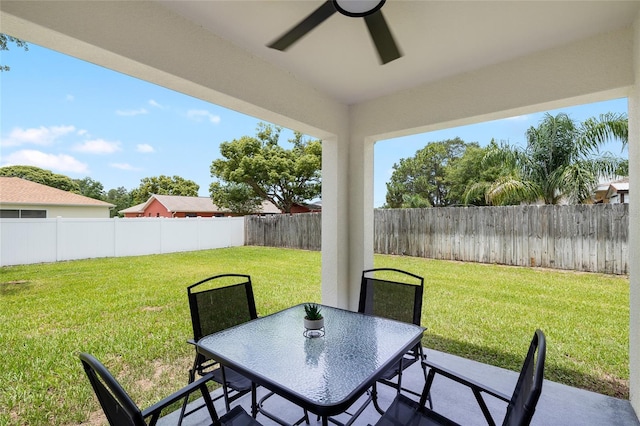 10452 Elgin Blvd, Spring Hill, FL 34608 - view of patio / terrace with a ceiling fan and outdoor dining space