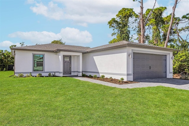 4625 Vernell St, North Port, FL 34291 - view of front facade with a garage, a front lawn, stucco siding, and decorative driveway