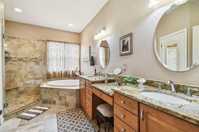 3484 Primrose Way, Palm Harbor, FL 34683 - bathroom featuring double vanity, a bath, a stall shower, and recessed lighting