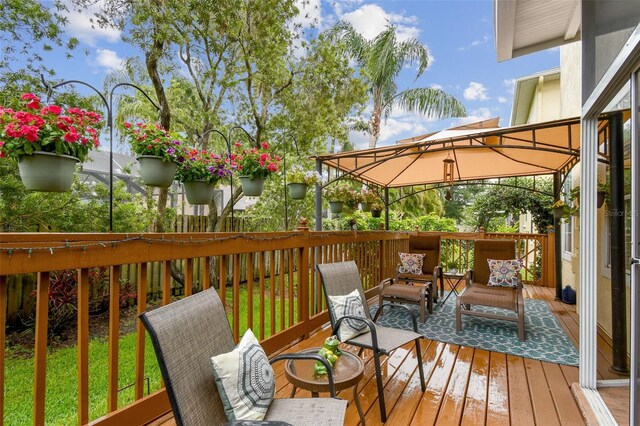 3484 Primrose Way, Palm Harbor, FL 34683 - deck with a gazebo and an outdoor living space
