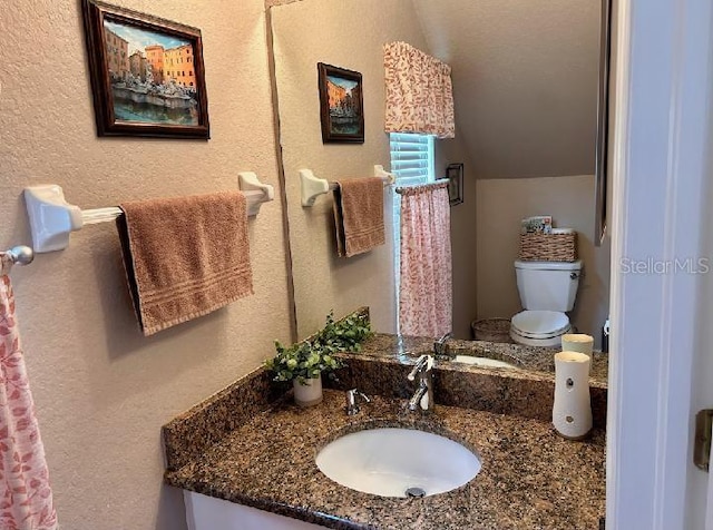 3484 Primrose Way, Palm Harbor, FL 34683 - bathroom with vanity and vaulted ceiling