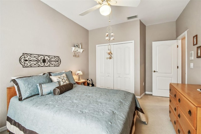 3484 Primrose Way, Palm Harbor, FL 34683 - bedroom with a closet, light carpet, and a ceiling fan