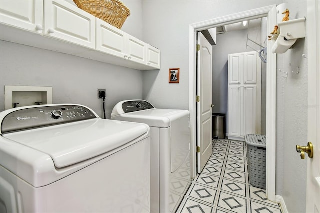 3484 Primrose Way, Palm Harbor, FL 34683 - laundry area with washing machine and dryer, cabinet space, and light tile patterned floors