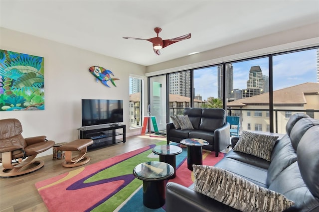 199 Dali Blvd Unit 607, Saint Petersburg, FL 33701 - living room featuring plenty of natural light, wood finished floors, and ceiling fan
