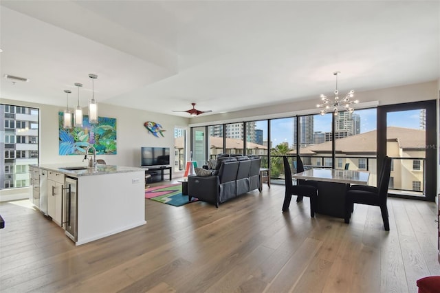 199 Dali Blvd Unit 607, Saint Petersburg, FL 33701 - living area with hardwood / wood-style floors and a chandelier