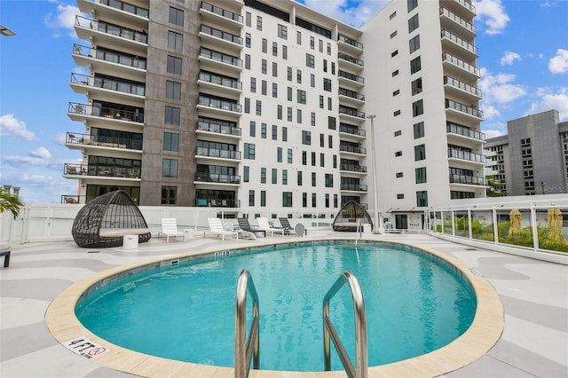 199 Dali Blvd Unit 607, Saint Petersburg, FL 33701 - community pool featuring a patio