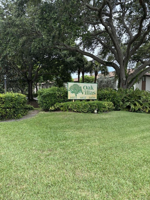 1055 6th Ave Unit A11, Vero Beach, FL 32960 - community / neighborhood sign featuring a lawn