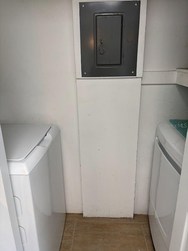 1055 6th Ave Unit A11, Vero Beach, FL 32960 - laundry area featuring independent washer and dryer and electric panel