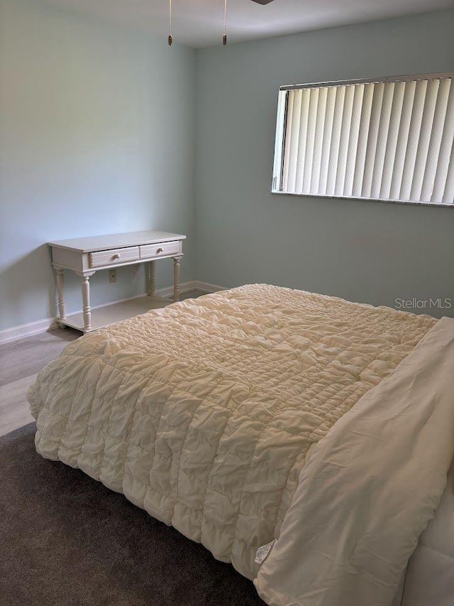 1055 6th Ave Unit A11, Vero Beach, FL 32960 - bedroom featuring baseboards