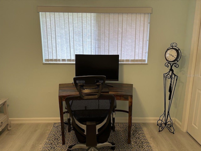 1055 6th Ave Unit A11, Vero Beach, FL 32960 - office featuring wood finished floors, plenty of natural light, and baseboards