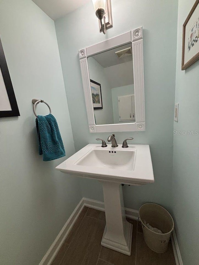 1055 6th Ave Unit A11, Vero Beach, FL 32960 - bathroom with baseboards