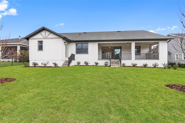 4799 Hickory Oak Loop, Brooksville, FL 34601 - view of front of home with a shingled roof, stucco siding, board and batten siding, and a porch