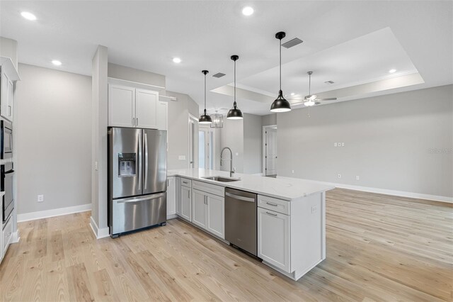 4799 Hickory Oak Loop, Brooksville, FL 34601 - kitchen featuring appliances with stainless steel finishes, a sink, light wood finished floors, ceiling fan, and recessed lighting