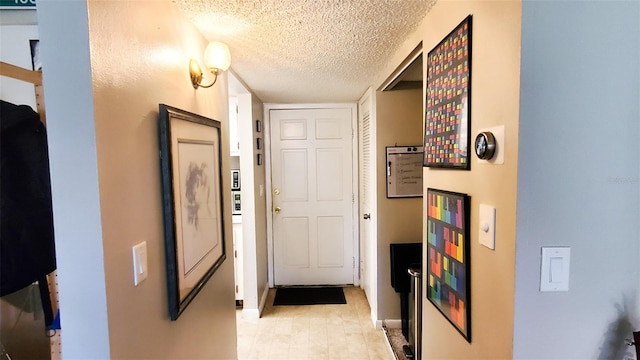 230 N Bayshore Blvd Unit 103, Clearwater, FL 33759 - corridor featuring a textured ceiling