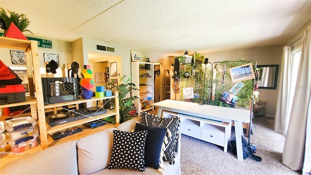 230 N Bayshore Blvd Unit 103, Clearwater, FL 33759 - living room featuring carpet flooring and a textured ceiling
