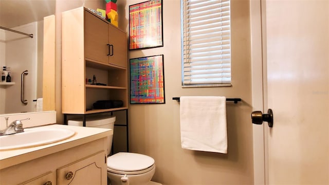 230 N Bayshore Blvd Unit 103, Clearwater, FL 33759 - bathroom featuring vanity, toilet, and a shower