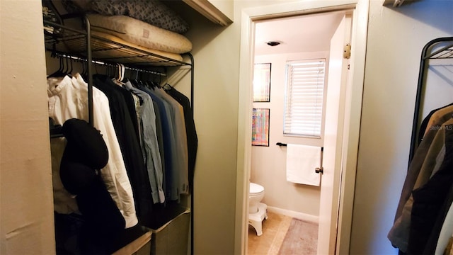 230 N Bayshore Blvd Unit 103, Clearwater, FL 33759 - bathroom with toilet and baseboards