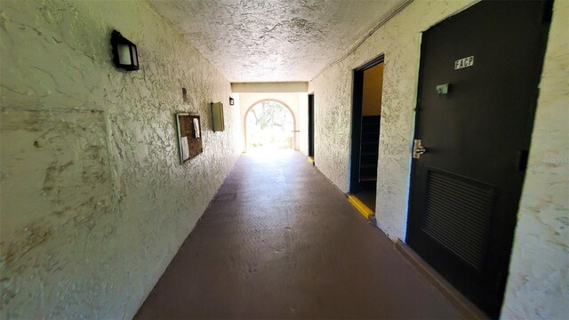 230 N Bayshore Blvd Unit 103, Clearwater, FL 33759 - hall with a textured wall and a textured ceiling