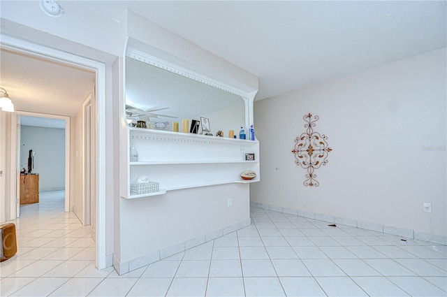 1655 S Highland Ave Unit B118, Clearwater, FL 33756 - empty room featuring tile patterned flooring and a smoke detector